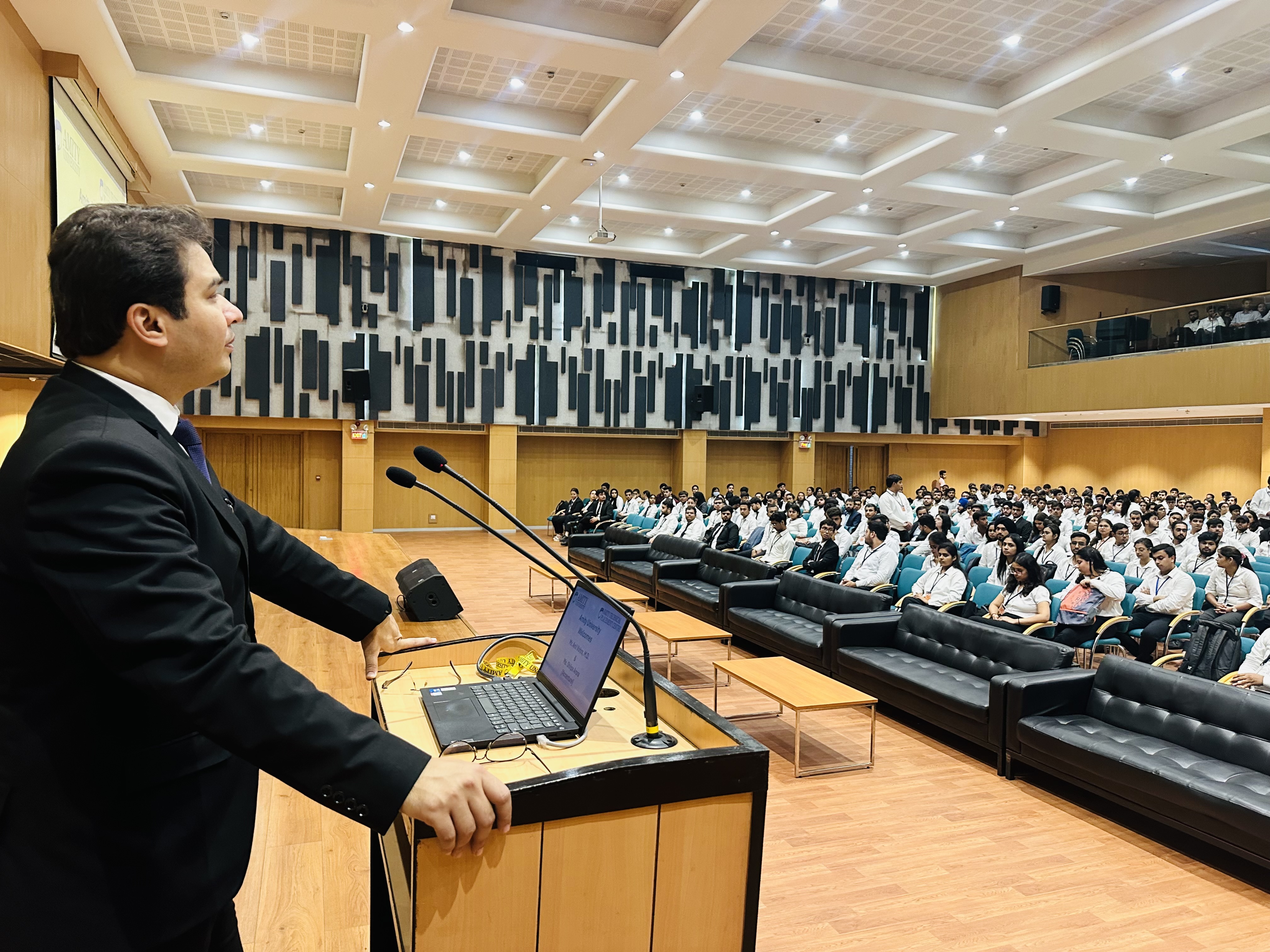 Addressing a packed auditorium